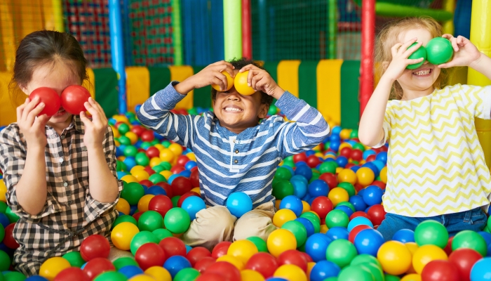 Portrait,of,three,funny,little,kids,playing,in,ball,pit
